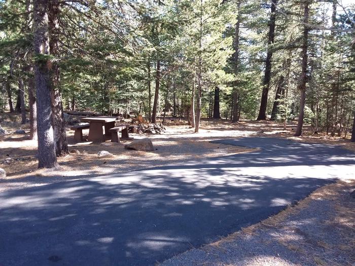 Rainbow Campground Campsite 120 Loop E: picnic table and stone fire pitRainbow Campground Campsite 120 Loop E