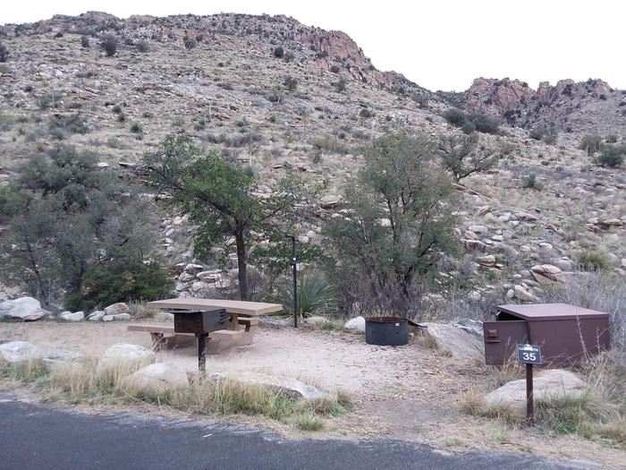 Site 35 with a picnic table, lantern pole, food storage, campfire ring and grillSite 35 with a picnic table, lantern pole, food storage, campfire ring and grill. Parking is within close walking distance.