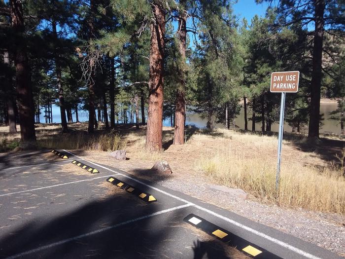 Day Use Parking for Kaibab Lake, which can be seen in backgroundDay Use Parking For Kaibab Lake