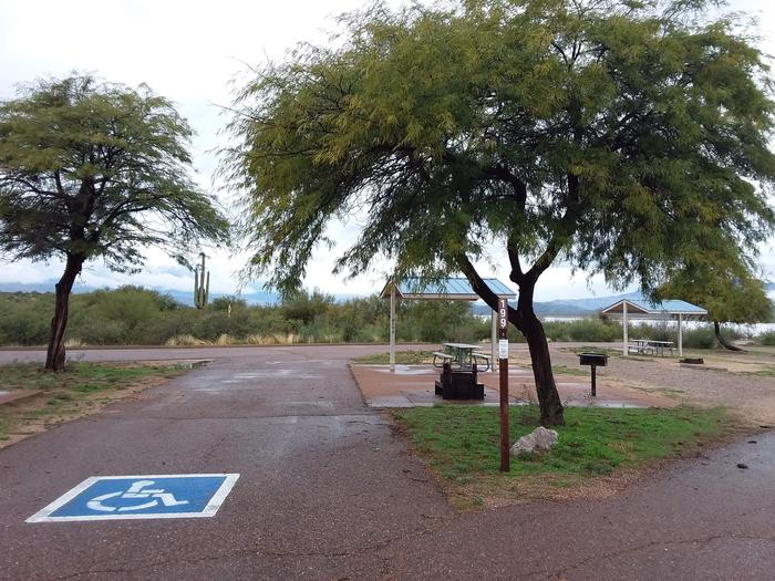 Handicap accommodating Campsite 199 with a paved parking space