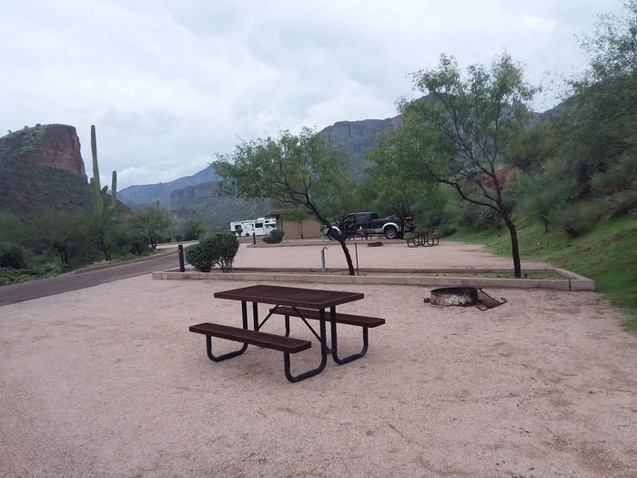 Tortilla Campground Site 32: table, fire pit, and a view with neighborsTortilla Campground Site 32