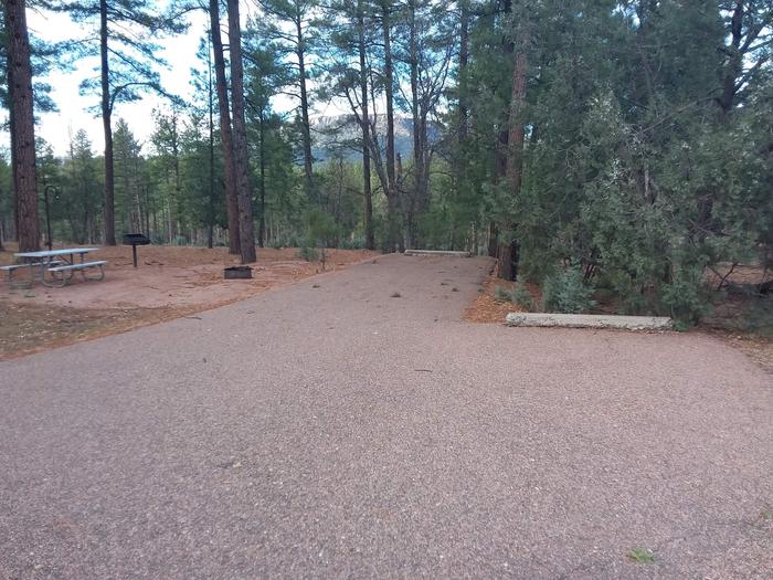 Juniper Loop Site 20 with paved parking spaces and mountain views