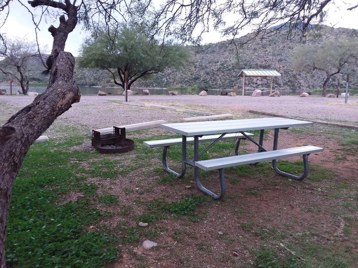 Campsite 39 at Burnt Corral Campground with a picnic table, fire ring, and parking.
