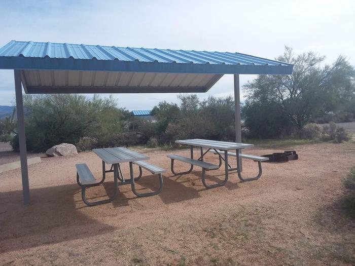 Campsite 175, Cane Loop with picnic tables, a fire ring, shade structure, and parking.