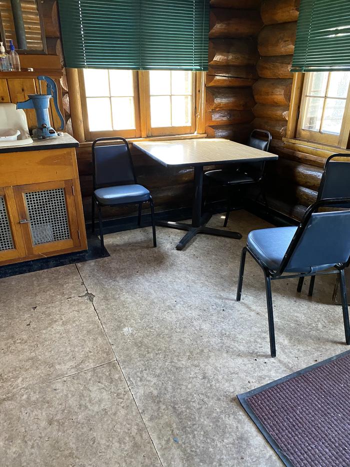 Table and chairs in main cabin area