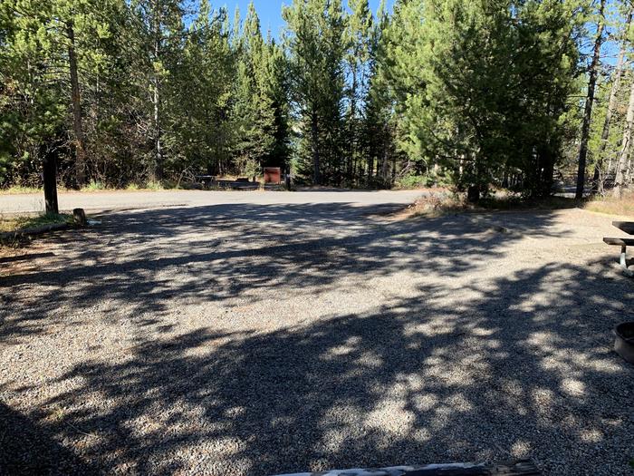 A photo of Site 3 of Loop 1 at Signal Mountain Lodge Campground with Picnic Table, Electricity Hookup, Fire Pit, Shade, Food Storage, Tent Pad