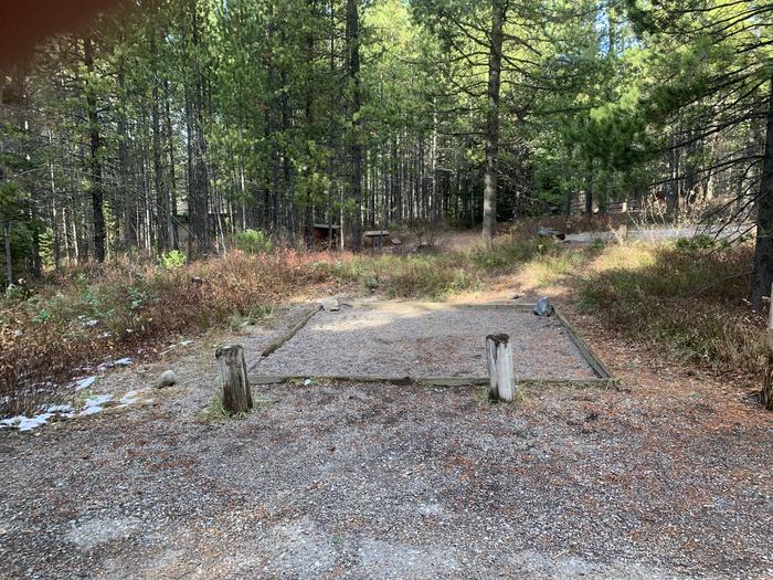 A photo of Site 59 of Loop 2 at Signal Mountain Lodge Campground with Picnic Table, Fire Pit, Shade, Food Storage, Tent Pad