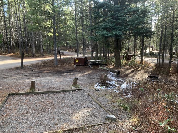 A photo of Site 59 of Loop 2 at Signal Mountain Lodge Campground with Picnic Table, Fire Pit, Shade, Food Storage, Tent Pad