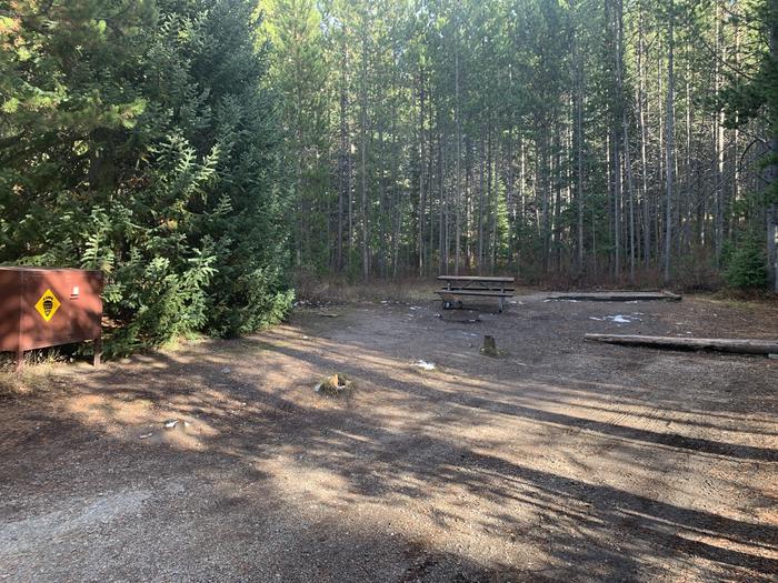 A photo of Site 60 of Loop 2 at Signal Mountain Lodge Campground with Picnic Table, Fire Pit, Shade, Food Storage, Tent Pad