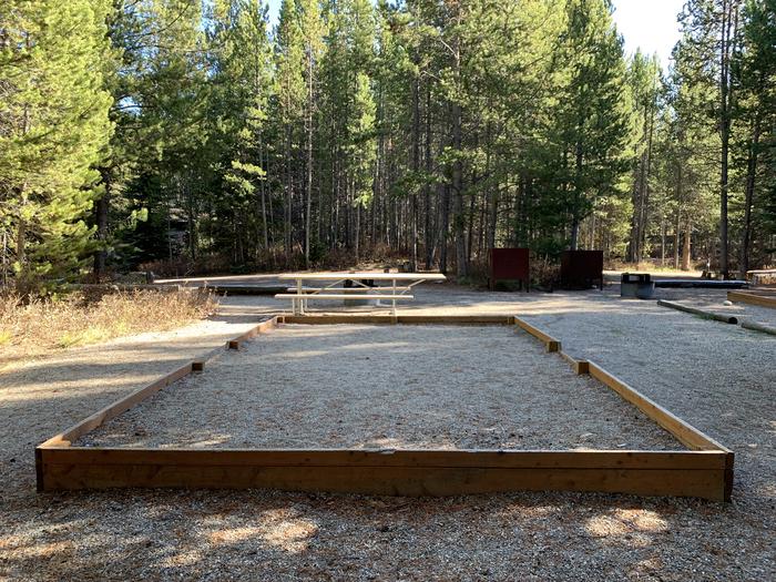 A photo of Site 43 of Loop 2 at Signal Mountain Lodge Campground with Picnic Table, Fire Pit, Shade, Food Storage, Tent PadADA Accessible.