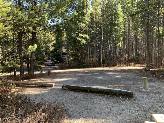 A photo of Site 43 of Loop 2 at Signal Mountain Lodge Campground with Picnic Table, Fire Pit, Shade, Food Storage, Tent PadADA Accessible. 