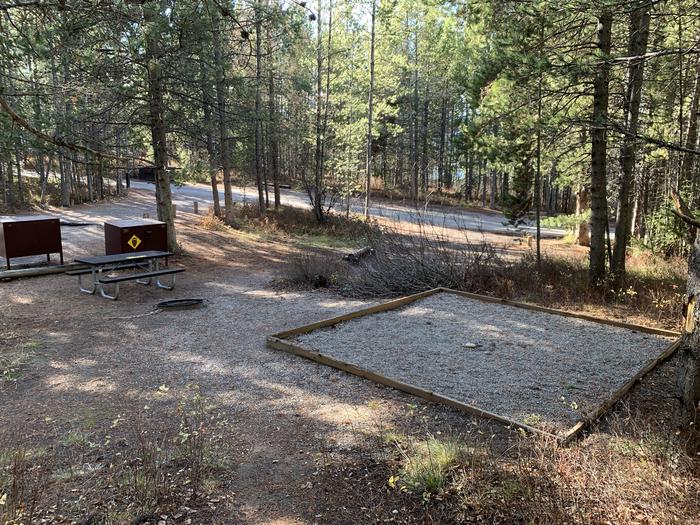 A photo of Site 45 of Loop 2 at Signal Mountain Lodge Campground with Picnic Table, Fire Pit, Shade, Food Storage, Tent Pad
