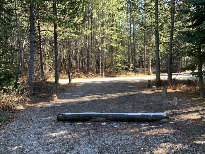 A photo of Site 44 of Loop 2 at Signal Mountain Lodge Campground with Picnic Table, Fire Pit, Shade, Food Storage, Tent PadADA Accessible. 
