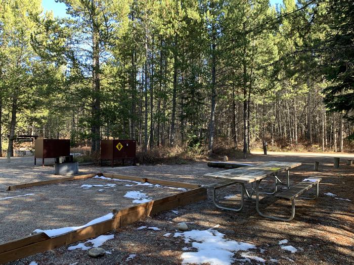A photo of Site 44 of Loop 2 at Signal Mountain Lodge Campground with Picnic Table, Fire Pit, Shade, Food Storage, Tent Pad