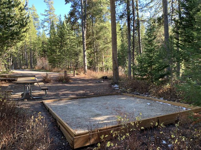 A photo of Site 39 of Loop 2 at Signal Mountain Lodge Campground with Picnic Table, Fire Pit, Shade, Food Storage, Tent Pad