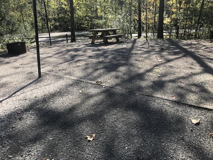 A photo of Site B019 of Loop B at TWIN KNOBS CAMPGROUND with Picnic Table, Electricity Hookup, Fire Pit, Shade, Tent Pad, Lantern Pole