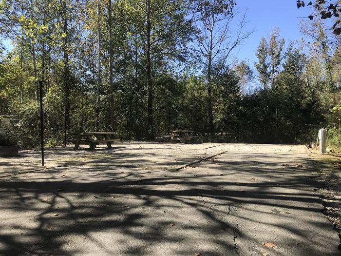 A photo of Site B016 of Loop B at TWIN KNOBS CAMPGROUND with Picnic Table, Fire Pit, Shade, Tent Pad, Full Hookup, Lantern Pole