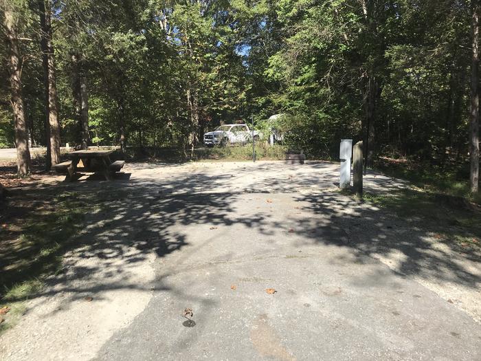 A photo of Site A029 of Loop A at TWIN KNOBS CAMPGROUND with Picnic Table, Electricity Hookup, Fire Pit, Tent Pad, Lantern Pole
