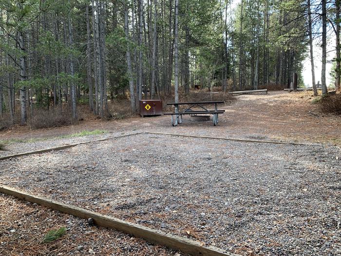 A photo of Site 70 of Loop 3 at Signal Mountain Lodge Campground with Picnic Table, Fire Pit, Shade, Food Storage, Tent Pad