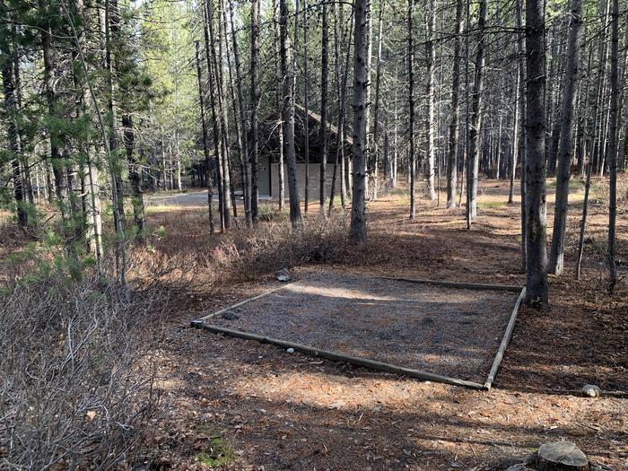 A photo of Site 73 of Loop 3 at Signal Mountain Lodge Campground with Picnic Table, Fire Pit, Shade, Food Storage, Tent Pad