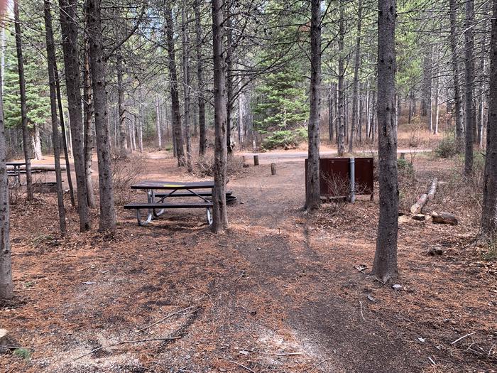 A photo of Site 82 of Loop 3 at Signal Mountain Lodge Campground with Picnic Table, Fire Pit, Shade, Food Storage