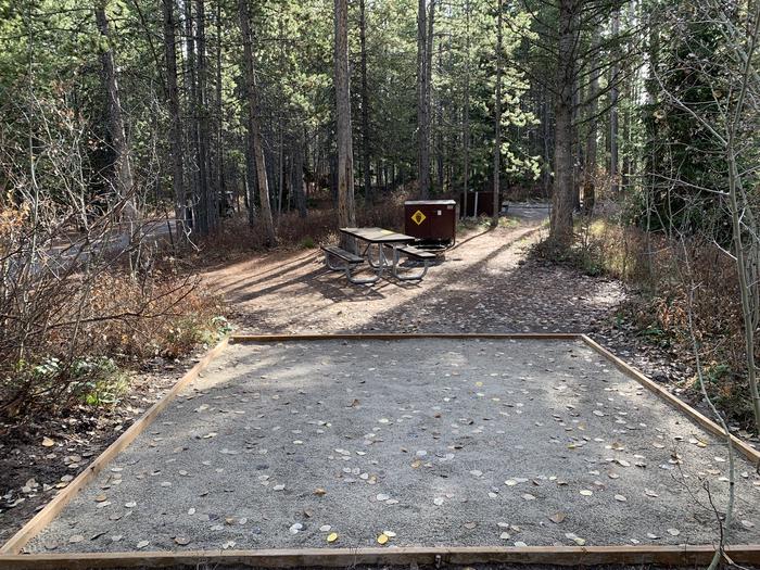 A photo of Site 72 of Loop 3 at Signal Mountain Lodge Campground with Picnic Table, Fire Pit, Shade, Food Storage, Tent Pad