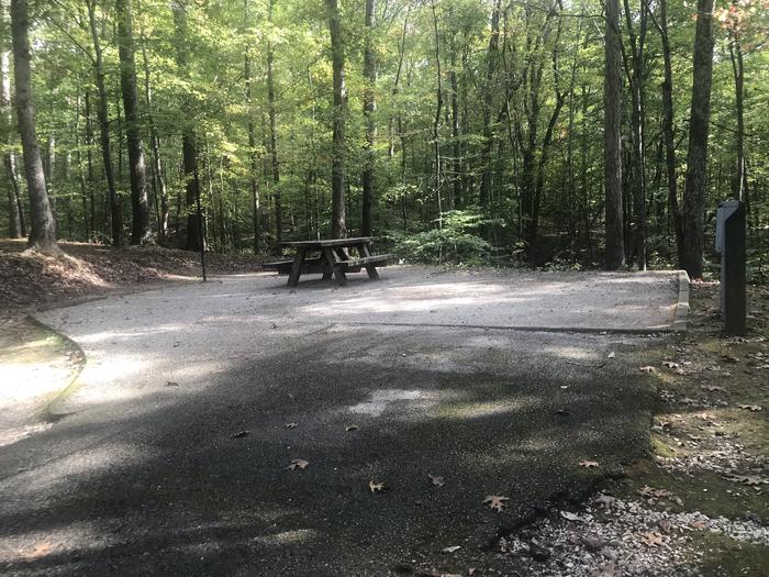 A photo of Site B002 of Loop B at TWIN KNOBS CAMPGROUND with Picnic Table, Electricity Hookup, Fire Pit, Shade, Tent Pad, Lantern Pole