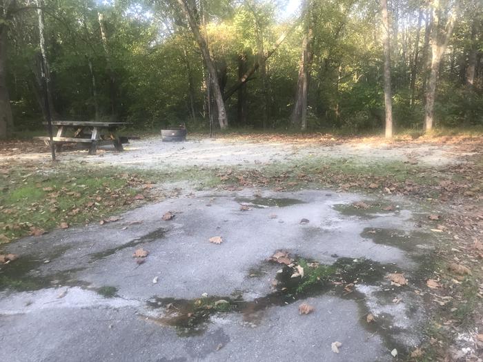 A photo of Site F001 of Loop F at TWIN KNOBS CAMPGROUND with Picnic Table, Fire Pit, Shade, Tent Pad, Lantern Pole