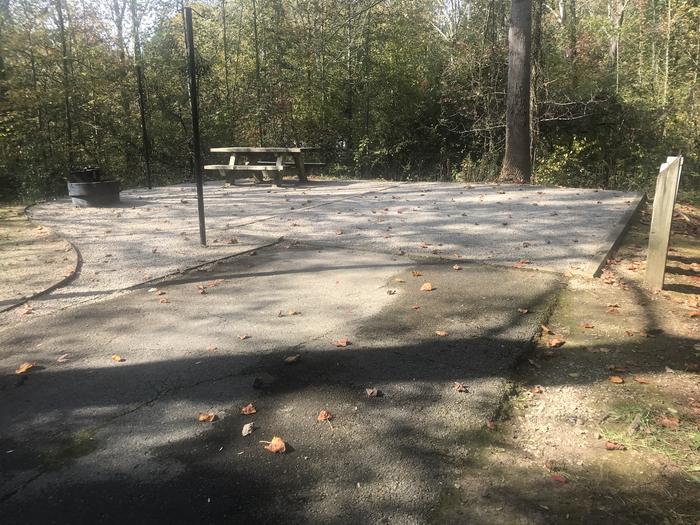 A photo of Site B011 of Loop B at TWIN KNOBS CAMPGROUND with Picnic Table, Electricity Hookup, Fire Pit, Shade, Tent Pad, Lantern Pole