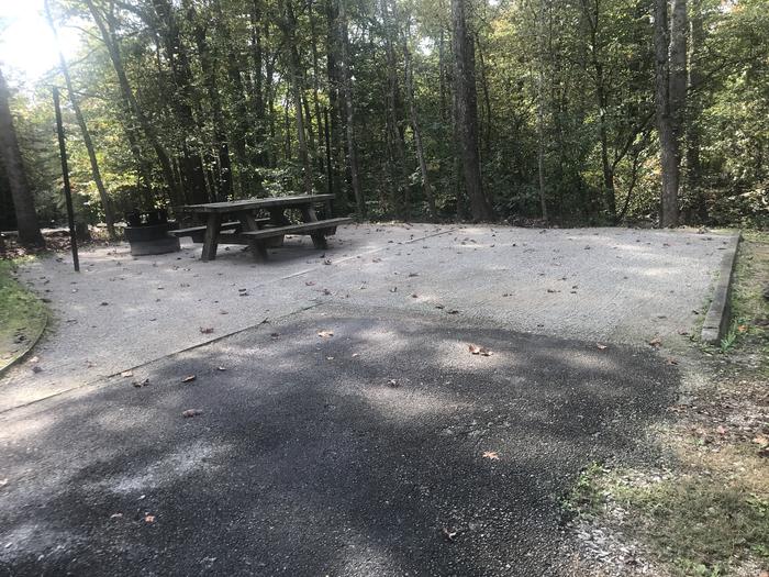 A photo of Site B003 of Loop B at TWIN KNOBS CAMPGROUND with Picnic Table, Electricity Hookup, Fire Pit, Shade, Tent Pad, Lantern Pole