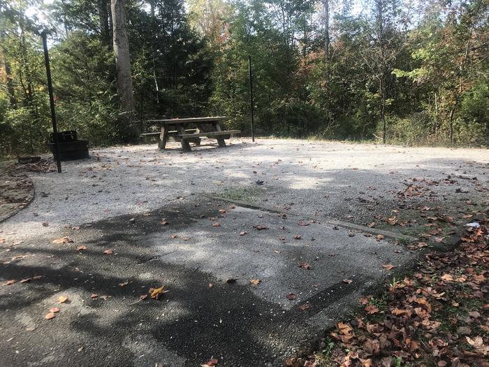 A photo of Site B013 of Loop B at TWIN KNOBS CAMPGROUND with Picnic Table, Electricity Hookup, Fire Pit, Shade, Tent Pad, Lantern Pole