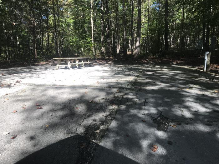 A photo of Site A016 of Loop A at TWIN KNOBS CAMPGROUND with Picnic Table, Electricity Hookup, Fire Pit, Shade, Tent Pad, Lantern Pole