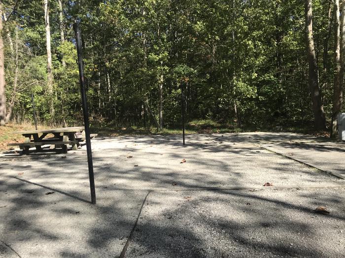 A photo of Site B015 of Loop B at TWIN KNOBS CAMPGROUND with Picnic Table, Electricity Hookup, Fire Pit, Shade, Tent Pad, Lantern Pole