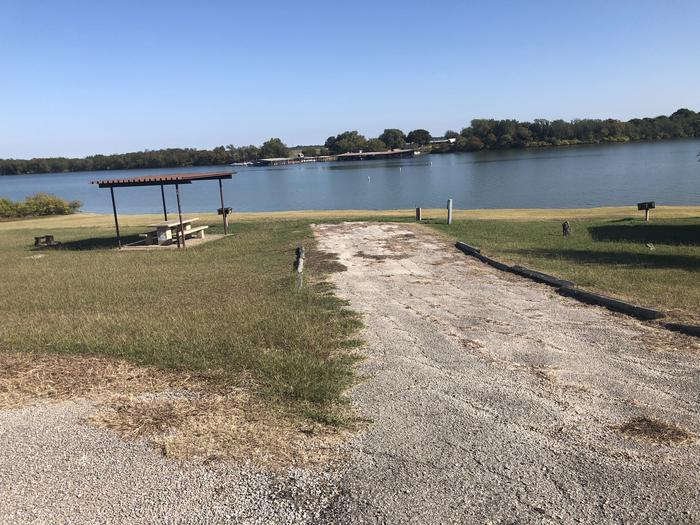 Back in site suitable for larger RVs; sheltered picnic area, fire ring, and grill onsite; water and 30amp electric hookups availableSite open April 1st through September 30th 