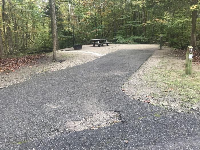 A photo of Site A007 of Loop A at TWIN KNOBS CAMPGROUND with Picnic Table, Electricity Hookup, Fire Pit, Shade, Tent Pad, Lantern Pole