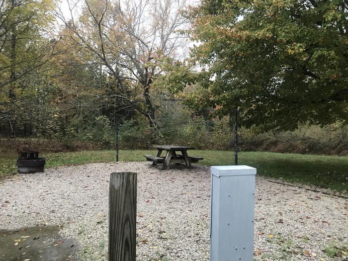 A photo of Site J023 of Loop J at TWIN KNOBS CAMPGROUND with Picnic Table, Fire Pit, Tent Pad, Lantern Pole