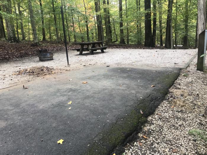 A photo of Site H001 of Loop H at TWIN KNOBS CAMPGROUND with Picnic Table, Electricity Hookup, Fire Pit, Shade, Tent Pad, Lantern Pole