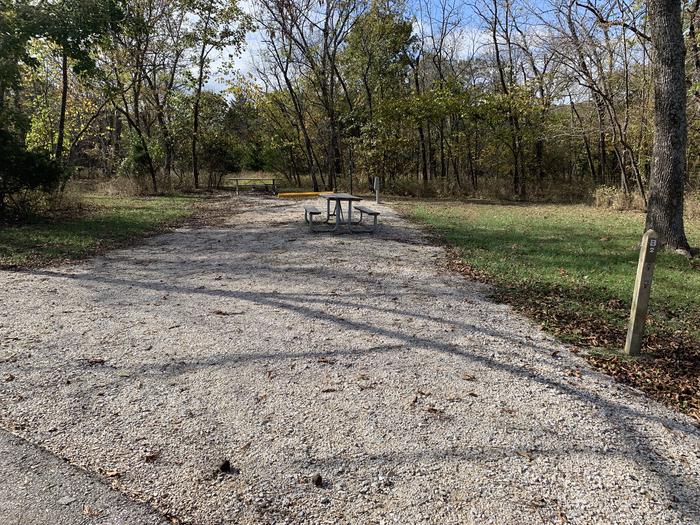 A photo of Site B02 of Loop EAST at RUARK BLUFF EAST with Picnic Table, Electricity Hookup, Fire Pit, Lantern Pole