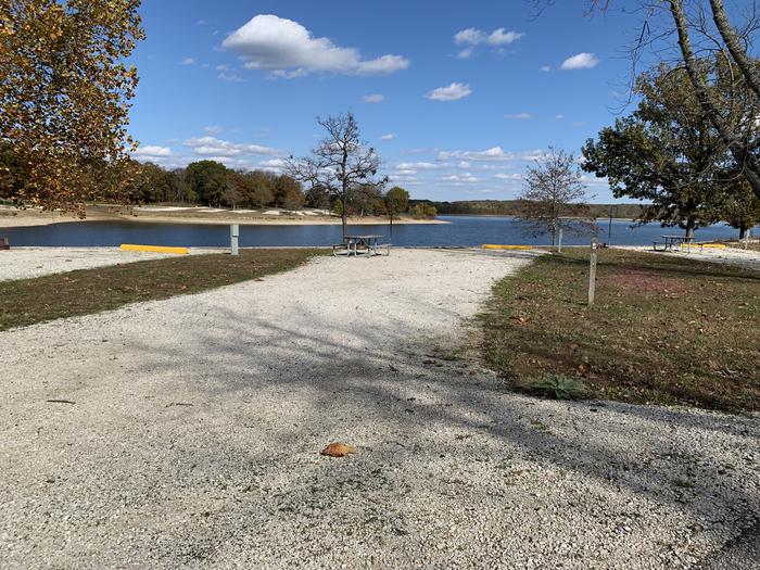 A photo of Site B10 of Loop EAST at RUARK BLUFF EAST with Picnic Table, Electricity Hookup, Fire Pit, Waterfront, Lantern Pole