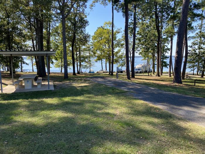 A photo of Site 59 of Loop LOOD at SAN AUGUSTINE with Picnic Table, Electricity Hookup, Fire Pit, Shade, Water Hookup, Lean To / Shelter