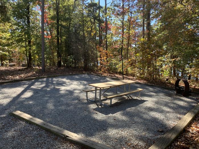 A photo of Site 032 of Loop A at NORTH BEND PARK with Picnic Table, Fire Pit, Tent Pad, Lantern Pole