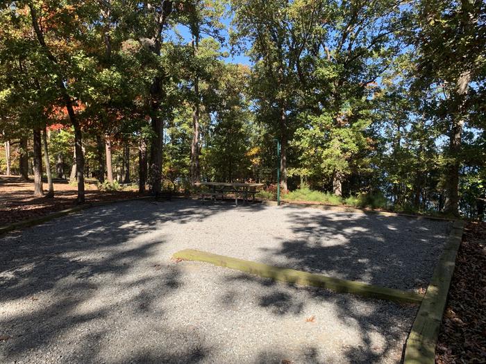 A photo of Site 044 of Loop A at NORTH BEND PARK with Picnic Table, Fire Pit, Shade, Tent Pad, Lantern Pole