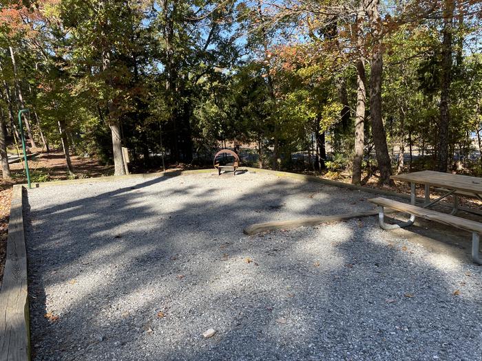 A photo of Site 048 of Loop A at NORTH BEND PARK with Picnic Table, Fire Pit, Tent Pad, Lantern Pole