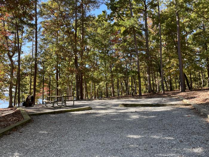 A photo of Site 018 of Loop A at NORTH BEND PARK with Picnic Table, Fire Pit, Shade, Tent Pad