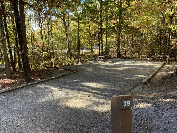 A photo of Site 039 of Loop C38 at RUDDS CREEK REC. AR. with Picnic Table, Electricity Hookup, Fire Pit, Lantern Pole, Water Hookup