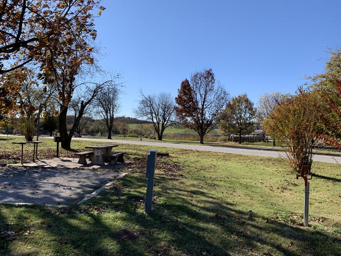A photo of Site 1 of Loop  at Brush Creek Public Use Area with Picnic Table, Electricity Hookup, Fire Pit, Shade, Tent Pad, Lantern Pole, Water Hookup