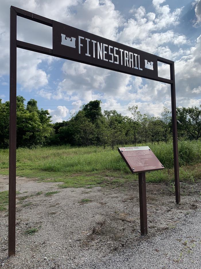 Unique to Keystone Lake, a mile long fitness trail located in Brush Creek offers obstacles. Featured is the entrance to the trail. A photo of fitness trail facility Brush Creek Public Use Area