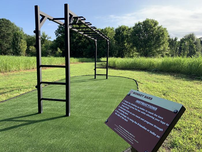 Unique to Keystone Lake, a mile long fitness trail located in Brush Creek offers obstacles. Featured is the monkey bar station which is located at one of four stations on the trail.A photo of facility Brush Creek Public Use Area