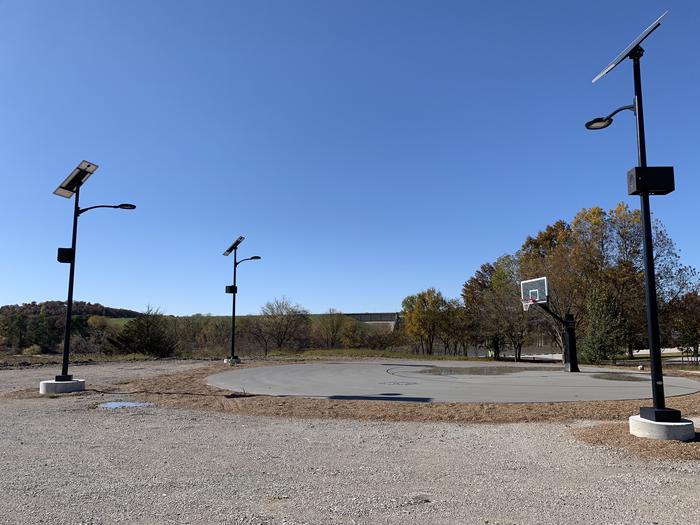 Brush Creek basketball court located at the top of the park near the fitness trail offers ample parking space, a short walk to the campgrounds, and light post for late night games.A photo of facility Brush Creek Public Use Area