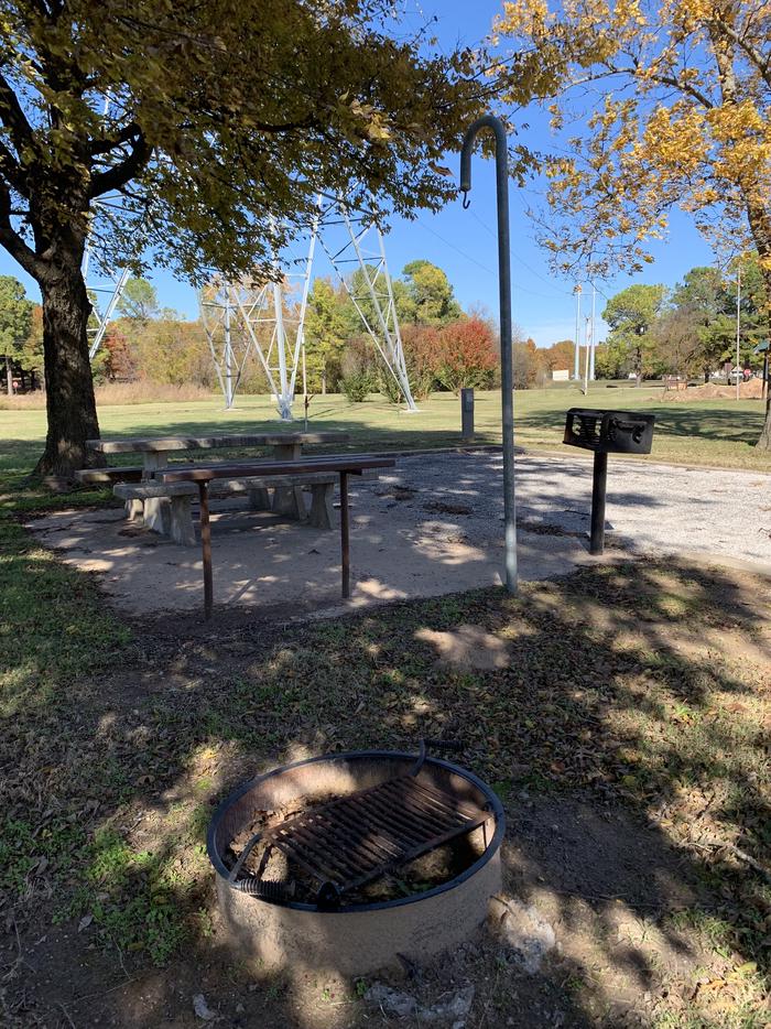 A photo of Site 15 of Loop  at Brush Creek Public Use Area A photo of Site 15 of Loop  at Brush Creek Public Use Area with Picnic Table, Electricity Hookup, Fire Pit, Shade, Tent Pad, Water Hookup
